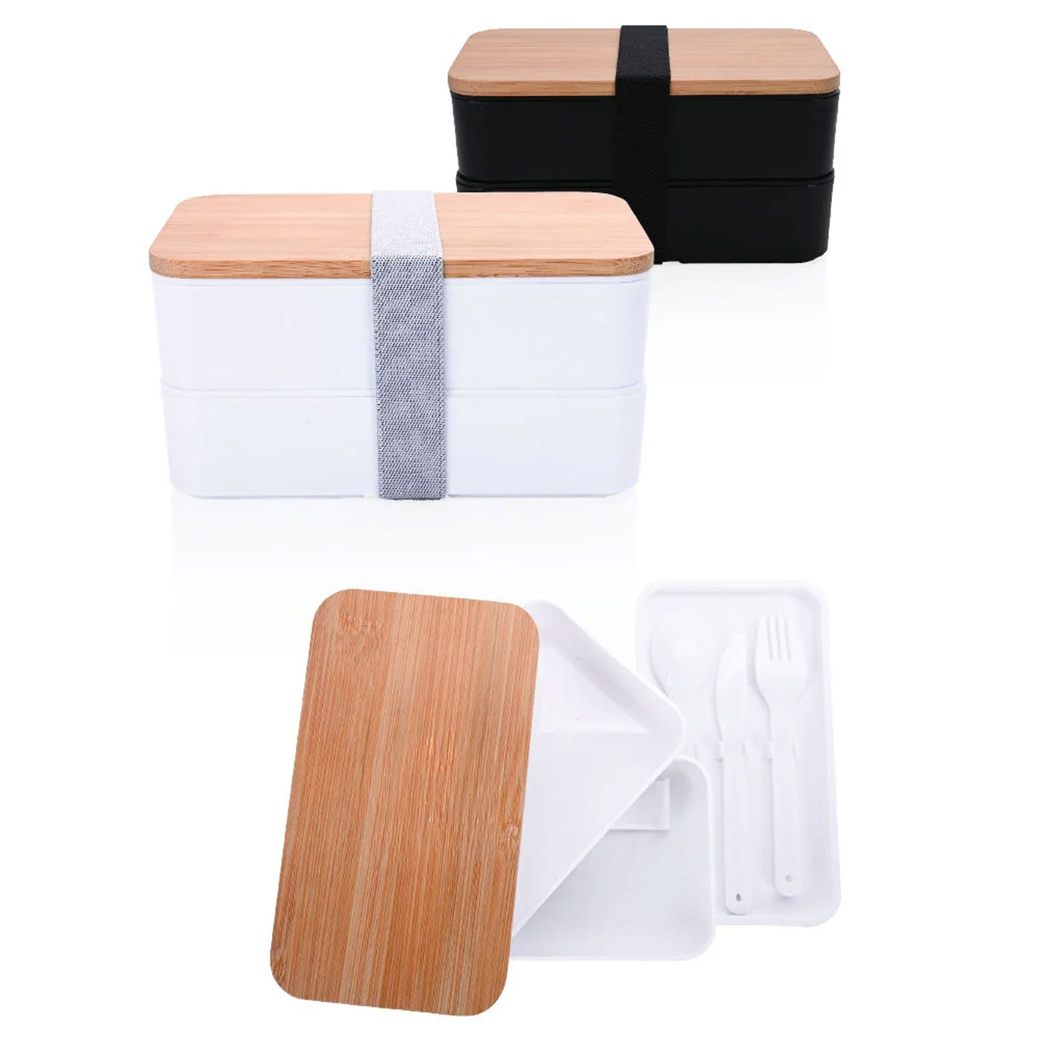 Lunchbox Double Level in Schwarz und Weiß ohne Werbedruck, geöffnet mit Besteck und Bambusdeckel dargestellt.