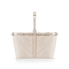 Reisenthel Carrybag Teddy sand in Seitenansicht mit aufgestelltem Griff