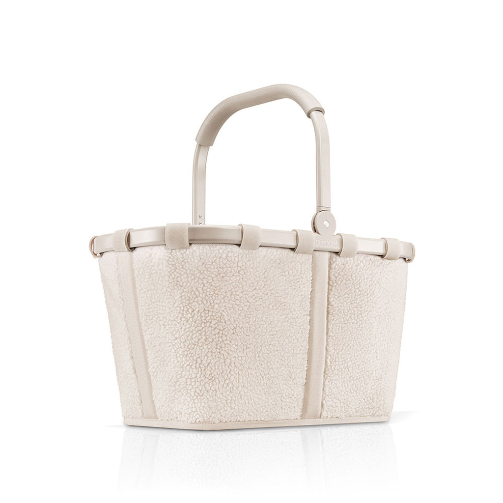 Reisenthel Carrybag Teddy sand in Frontansicht mit schräg gestelltem Griff